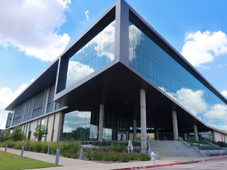 Smart Hospital-Social Work building exterior street view with mustang statue