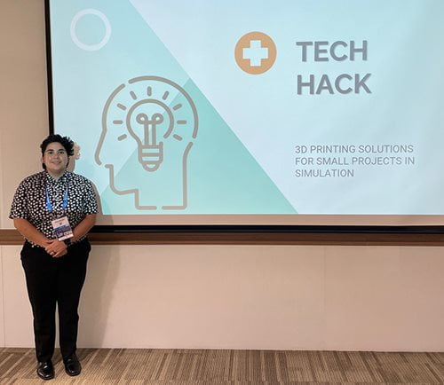 Erica Hinojosa giving presentation - Tech Hack