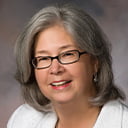 Portrait of Elizabeth Merwin with a grey muslin backdrop