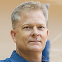Portrait of Larry Nelson in the Maverick Activity Center gymnasium