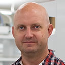 Portrait of Daniel Trott in a laboratory