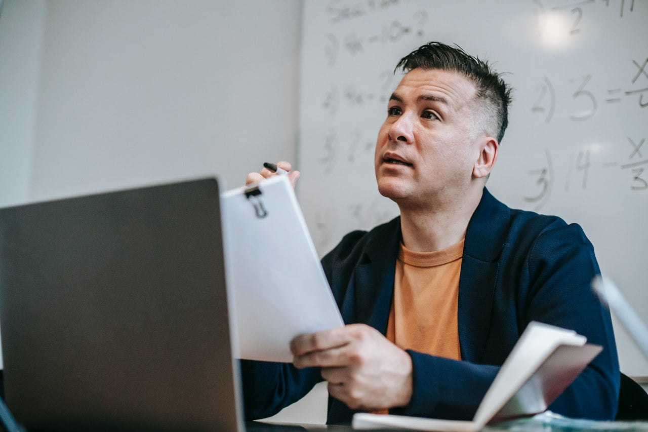 A person works on a laptop