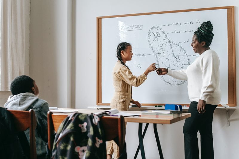Woman teaching science class