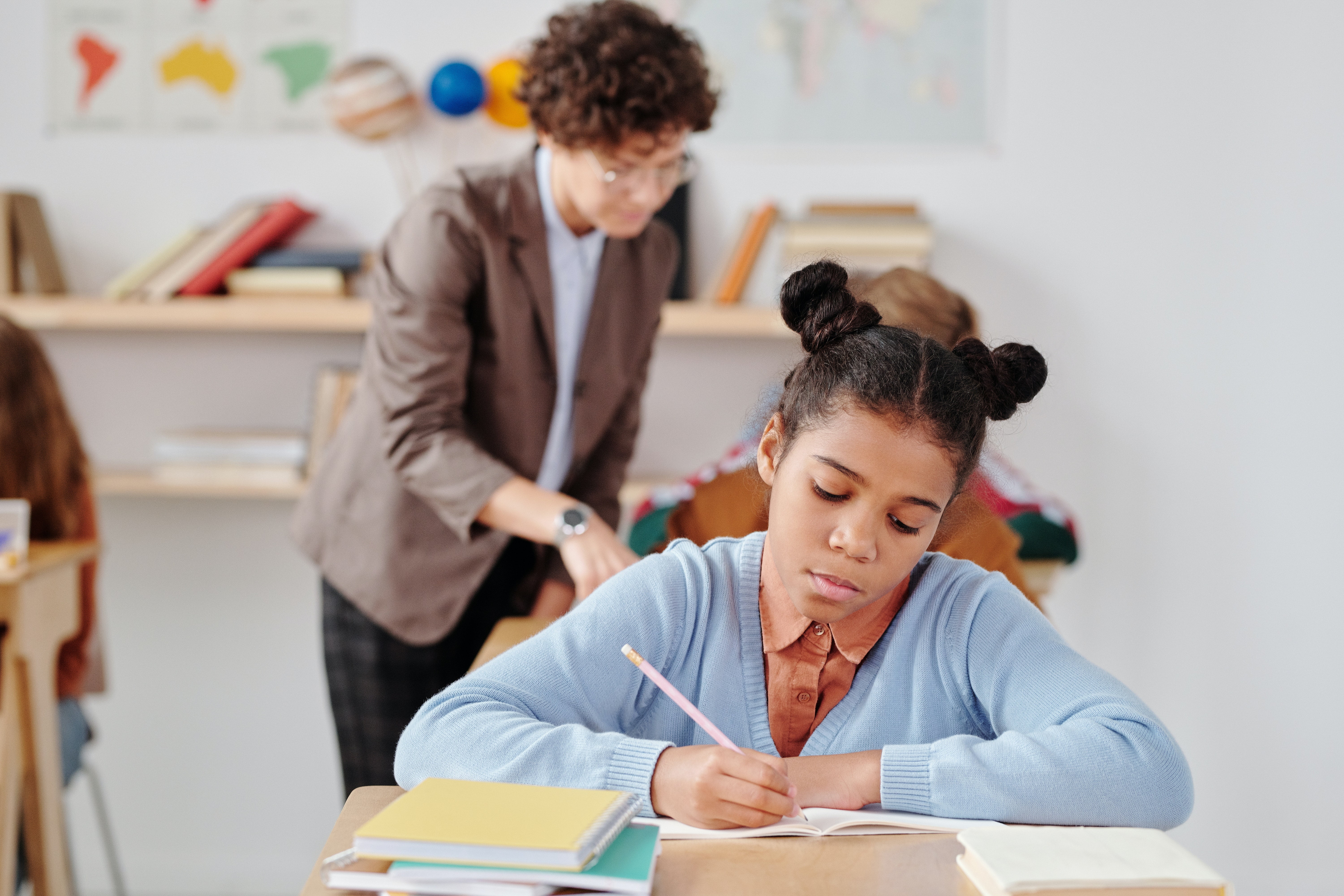 Teacher and students in a classroom 