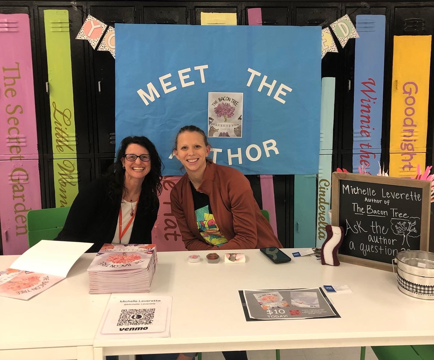 Author Michelle Leverette poses for a photo at an elementary school's literacy night event