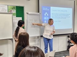 Bree Jimenez instructing a class of teachers