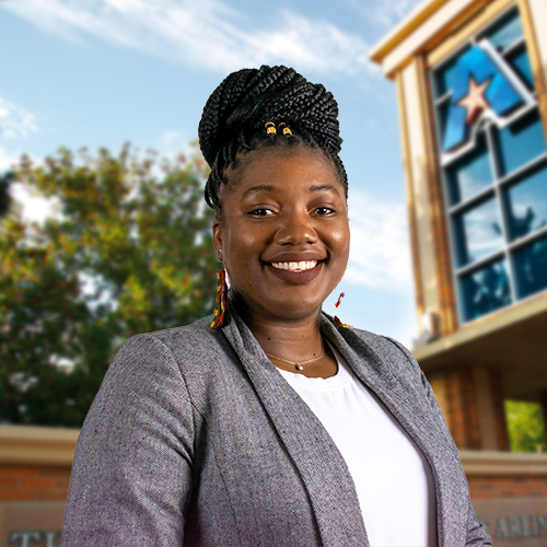 Headshot of University of Texas at Arlington employee Wideline Seraphin. The background shows a UTA campus sign.