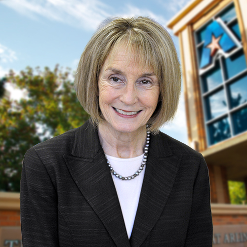 Headshot of University of Texas at Arlington employee Kahtleen Tice. The background shows a UTA campus sign.