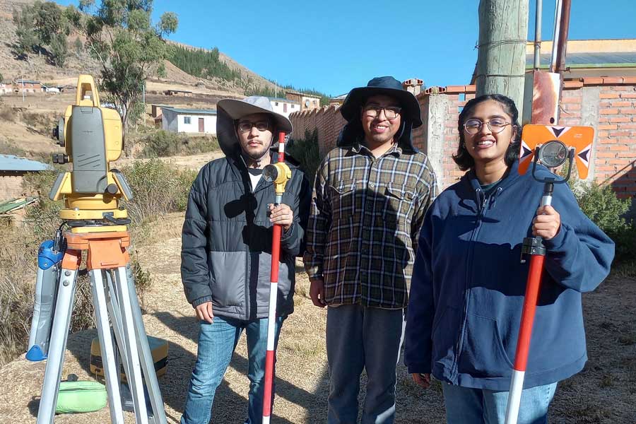 Engineers Without Borders students on a construction site.