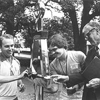 Engineering students polish the Chi Epsilon key