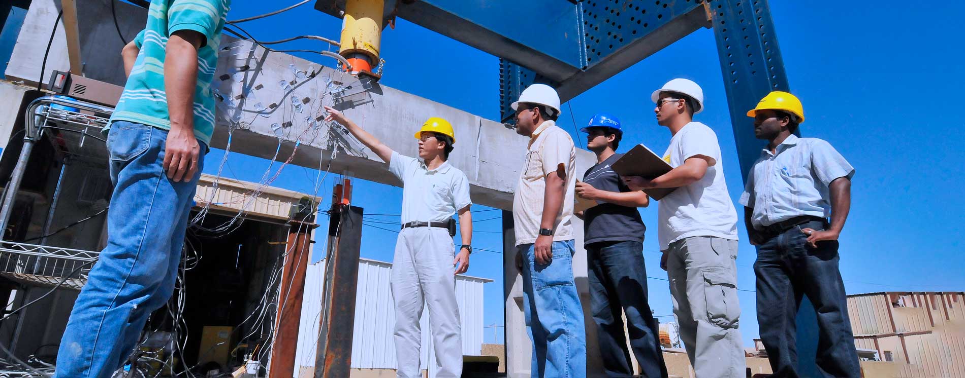 Civil Engineer testing concrete beams.