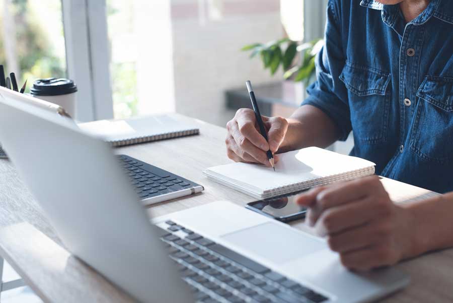 Student Studying at home on a laptop