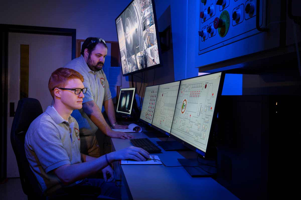 Two engineers in front of computer screens at the ARC