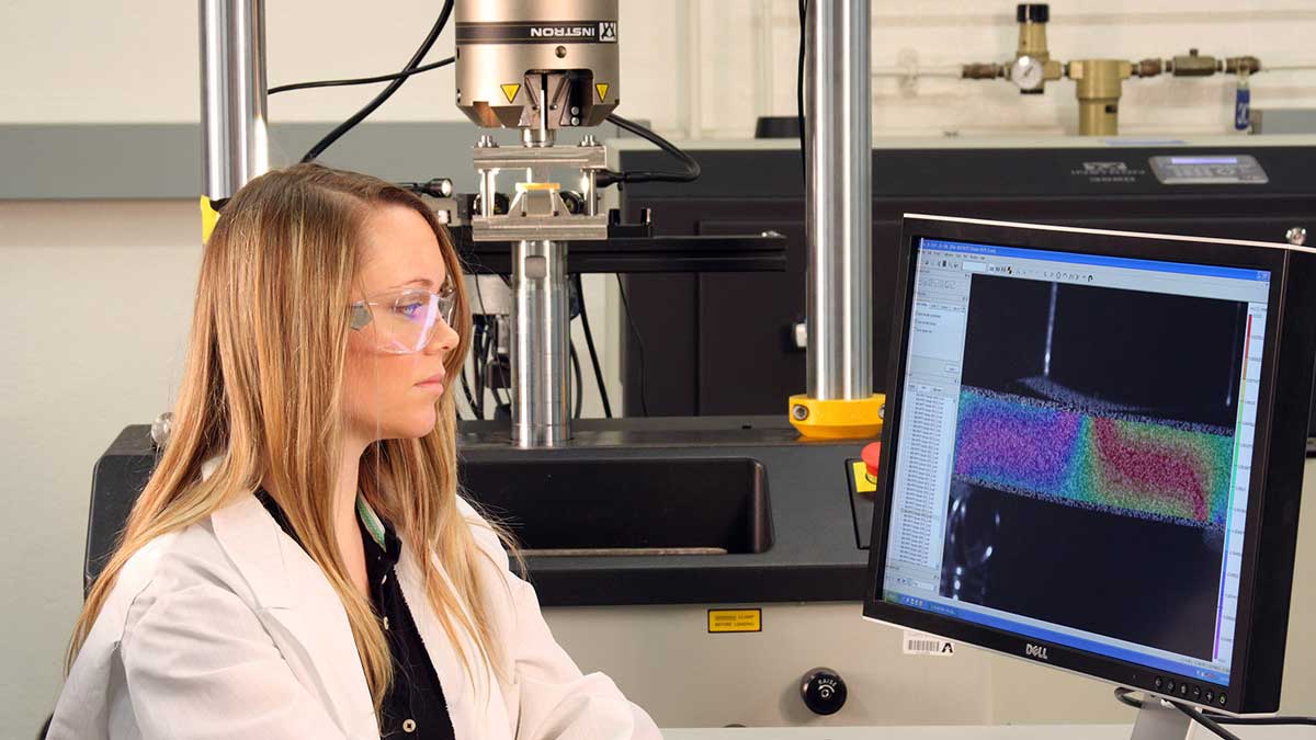 researcher in front of a computer