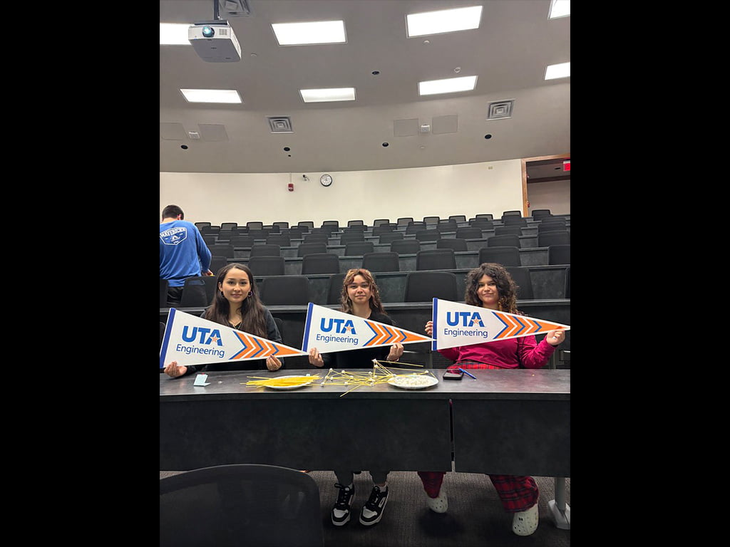 three students taking a picture