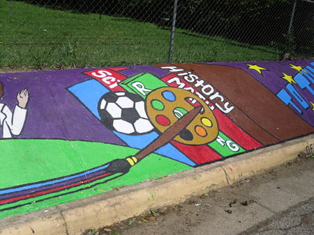 an art painting image of a soccer ball, brush, a reel with colors and yellow stars
