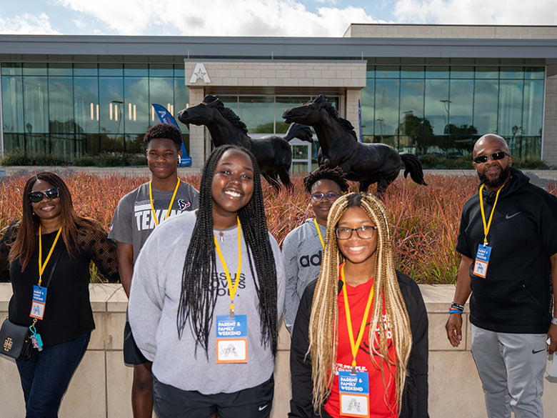 Family gathers at UTA Parents and Family Weekend. 