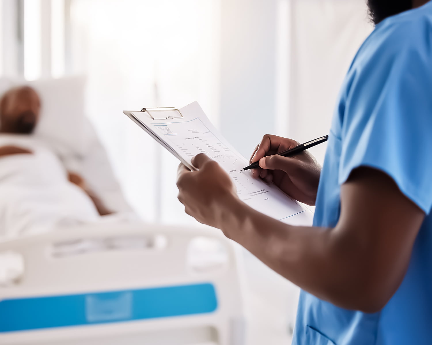 nurse writing on clip board