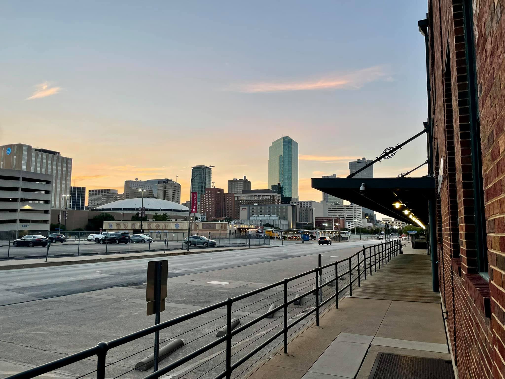 Exterior photo of UTA Fort Worth campus and downtown skyline