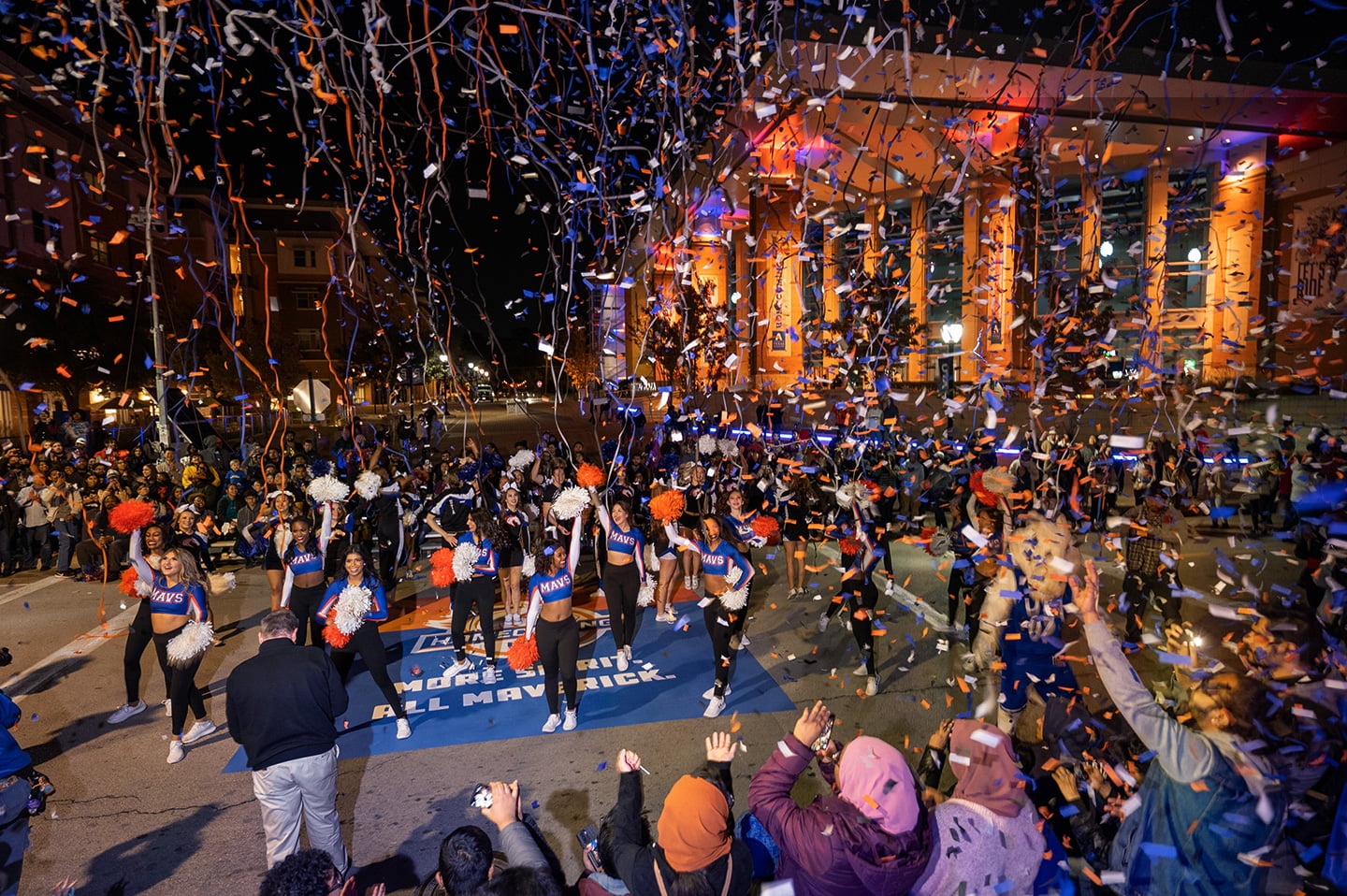 uta homecoming parade at night