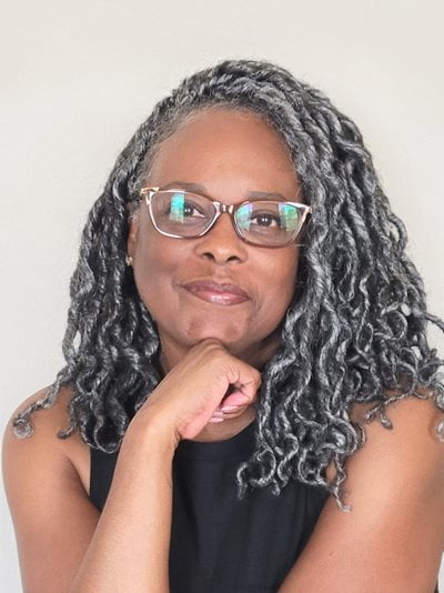 professional headshot of faye cocchiara, the chair of the disability employee network