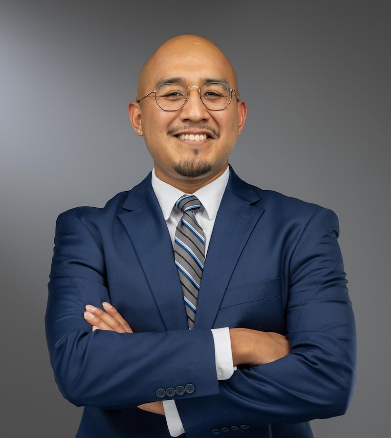 professional photograph of a male employee named Nico