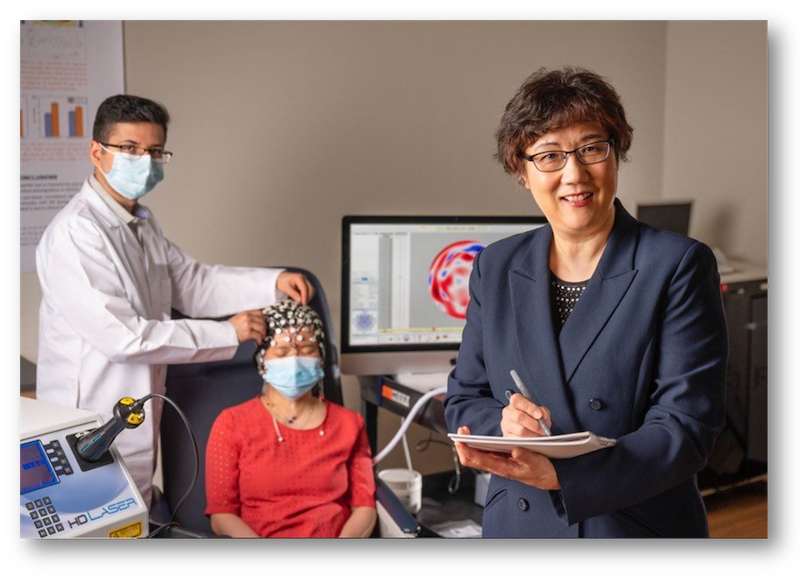 group of people - two of them have masks on