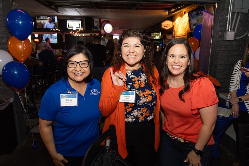 group of three women smiling