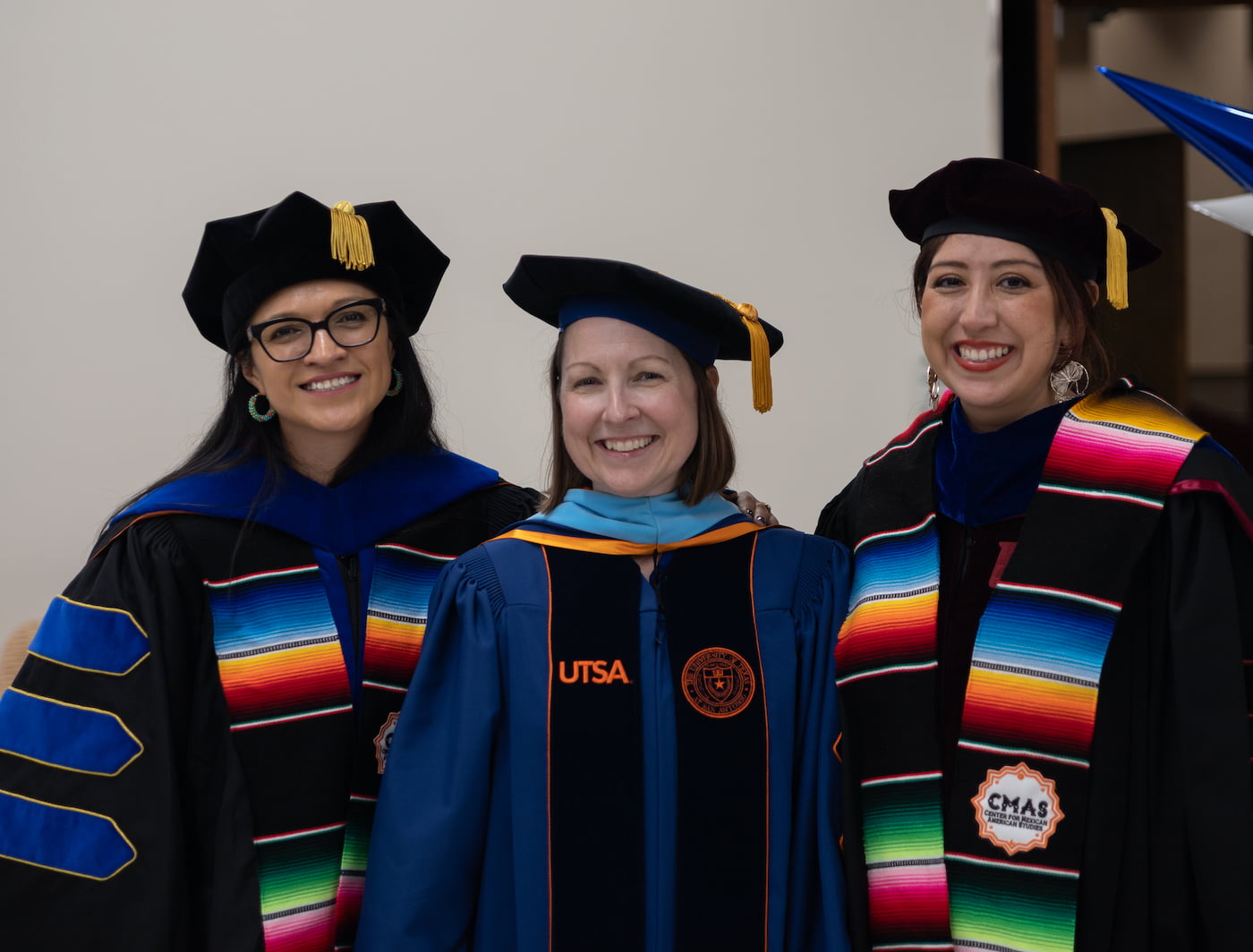 group of latino graduates