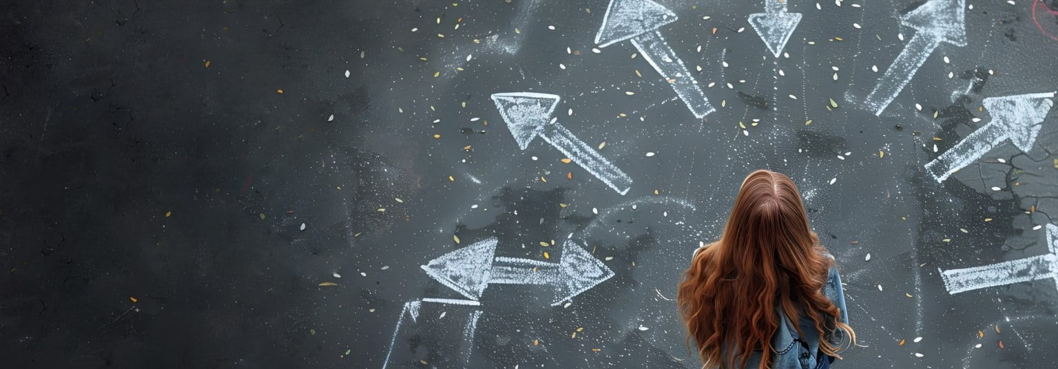a red headed woman standing on pavement with white arrows pointing away from her