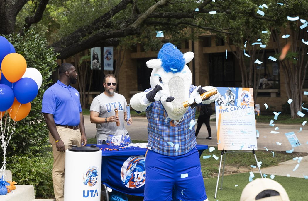 blaze popping confetti in front of the uta 130 time capsule
