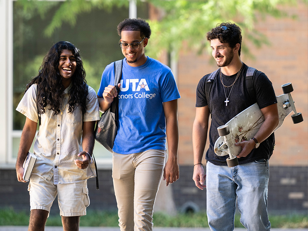 male students walking outside