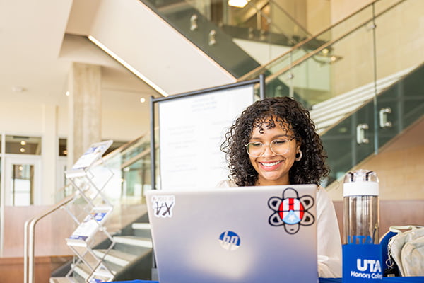 Student looking at laptop