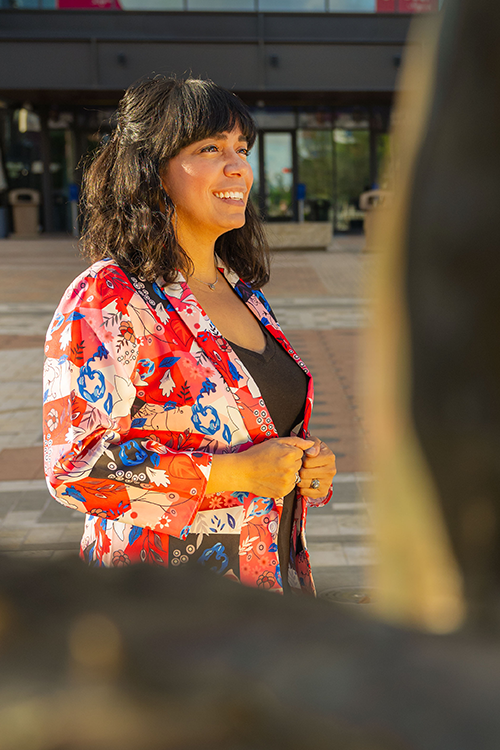 A woman in a floral top