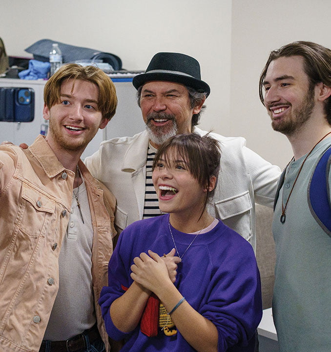 Lou Diamond Phillips and students