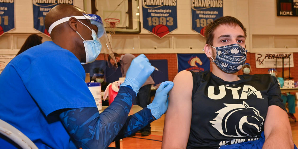 Student receiving a vaccine