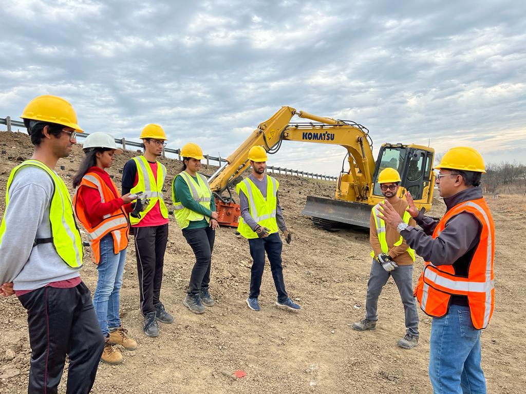 Professor Sahadat Hossain explains the project to students.