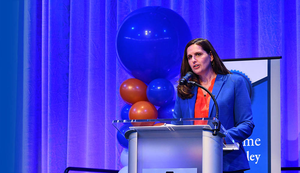 president jennifer cowley speaking at the welcome reception