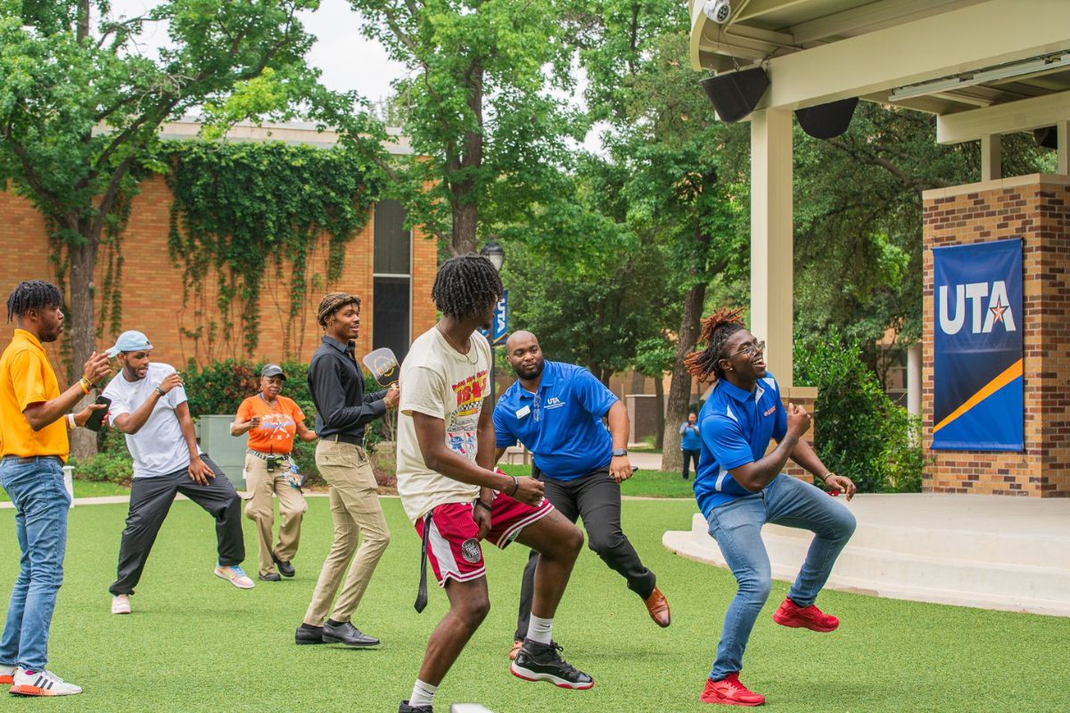 Students dancing at UTA