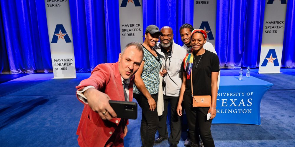 Platon Antoniou takes a photo with attendants