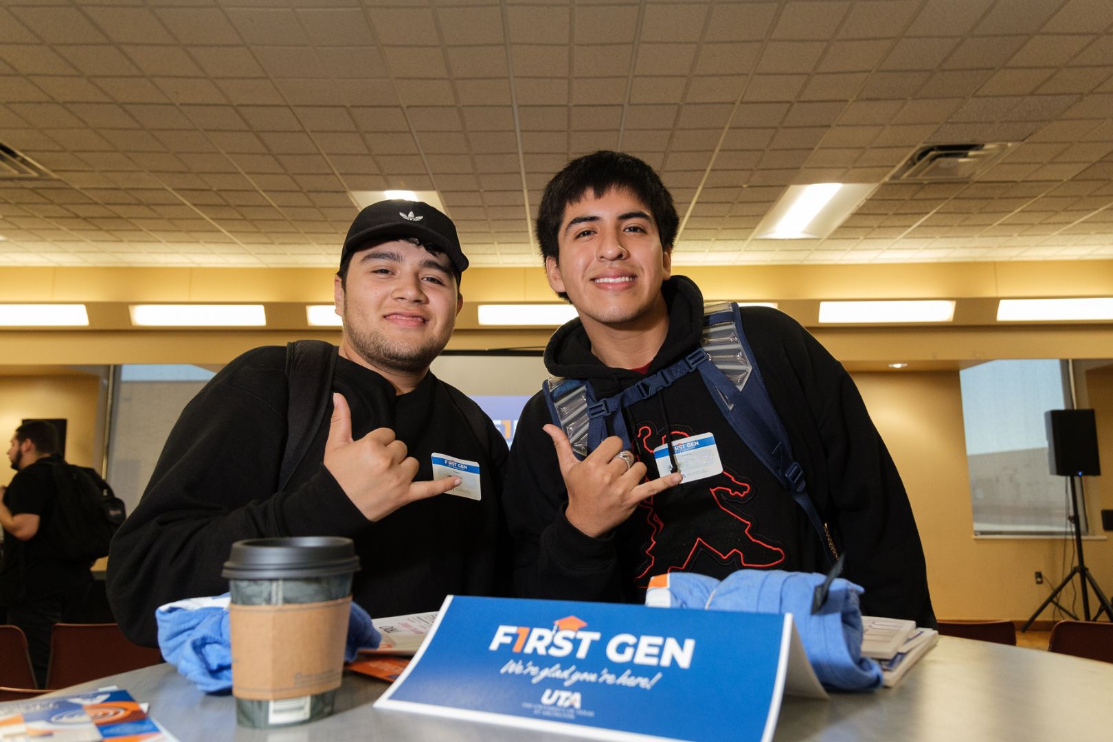 Image shows two UTA students Mav Up at UTA first-gen event
