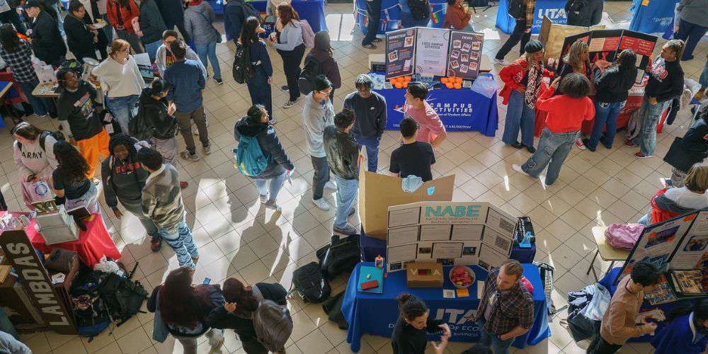 Students in the Palo Duro Lounge of the University Center during the Maverick Activity Fair