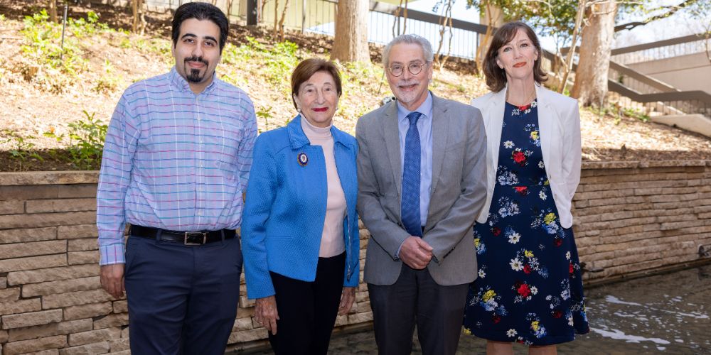 Salman Sohrabi, Marion Ball, Jim Grover and Genevieve Graaf pose for a photo at a luncheon." _languageinserted="true