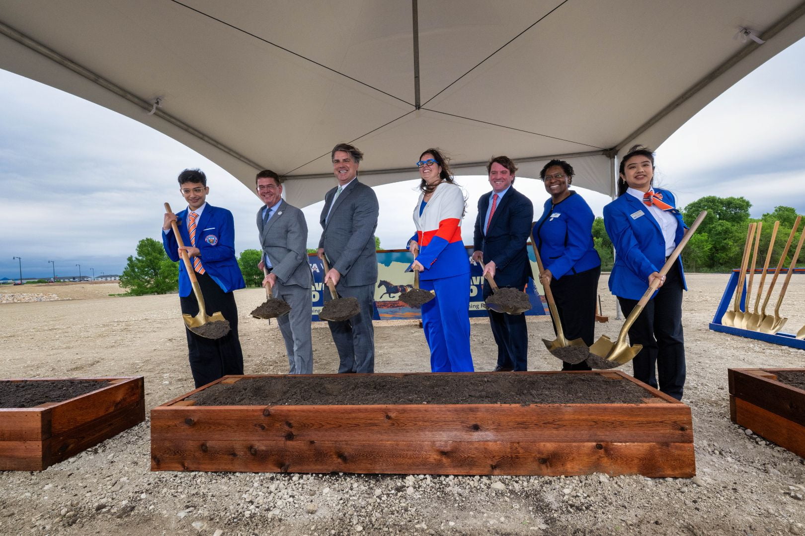 Image shows UTA officials turning the soil during the UTA West groundbreaking ceremony