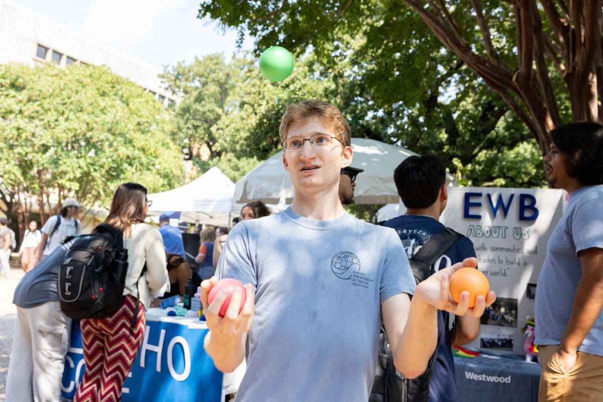 Students at The University of Texas at Arlington during the biannual Maverick Activity Fair and Cookout " style=" height:800px; width:1200px" _languageinserted="true" src="https://cdn.prod.web.uta.edu/-/media/project/website/news/releases/2025/08/maf-3.jpg