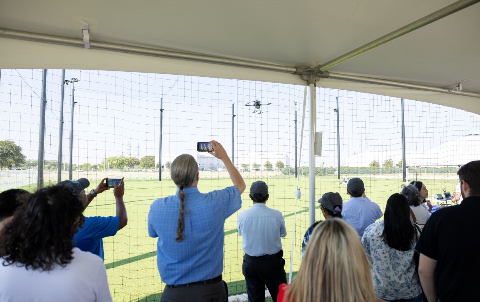 people at the opening of the Maverick Autonomous Vehicle Research Center 
