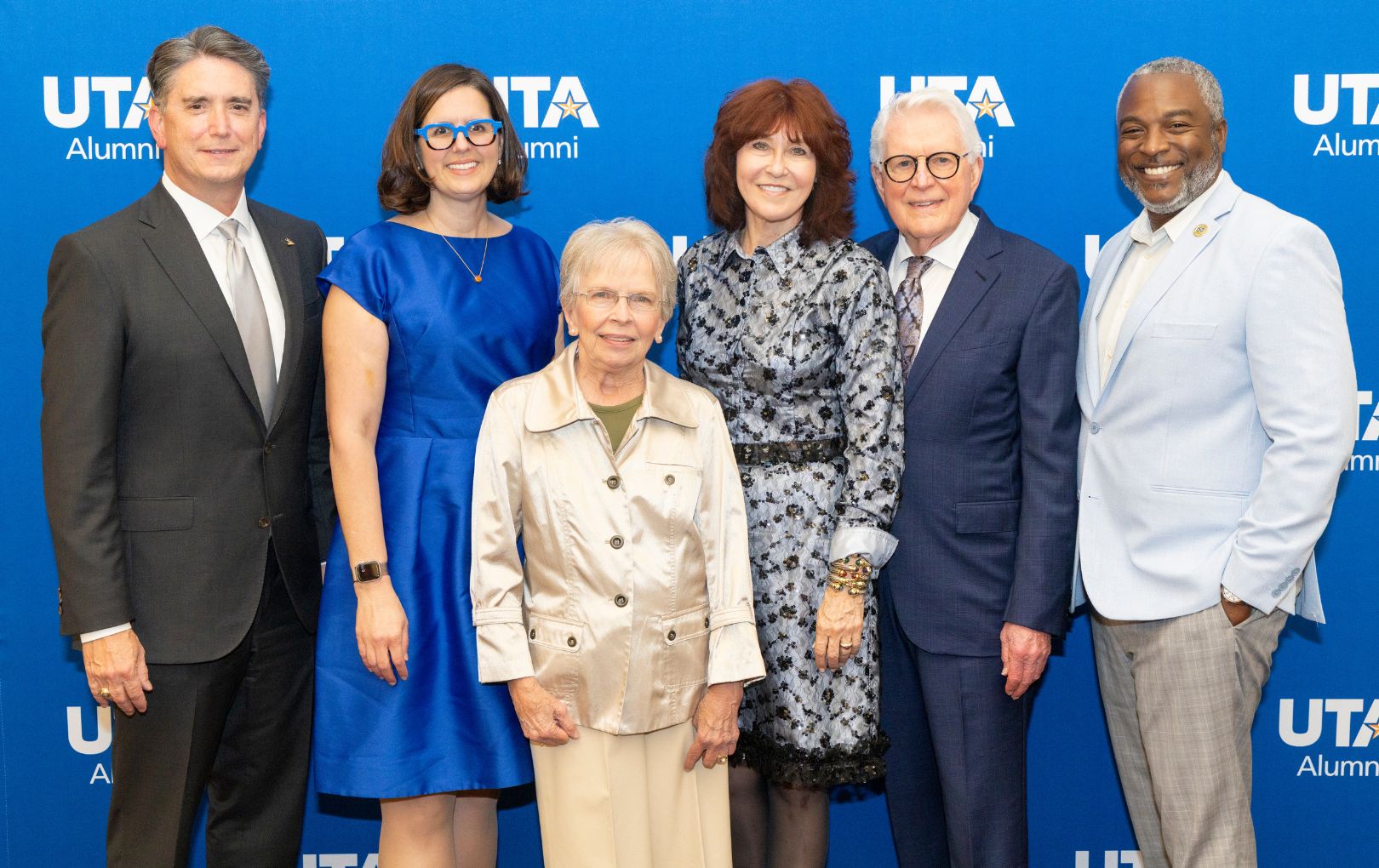 Distinguished Alumni Award recipients with UTA President Jennifer Cowley" style=" height:1020px; width:1620px" _languageinserted="true" src="https://cdn.prod.web.uta.edu/-/media/project/website/news/releases/2025/09/daa-5.jpg