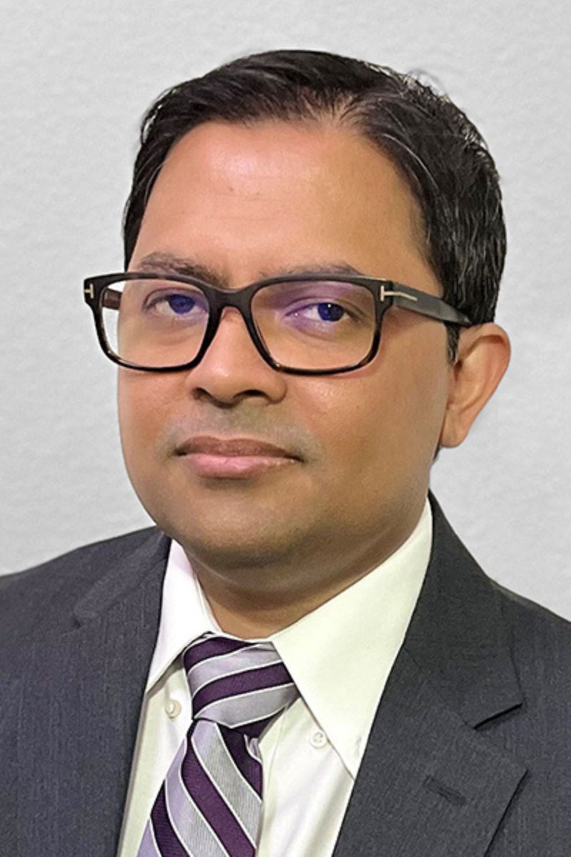 Image shows headshot of Dr. Mahmudur Rahman