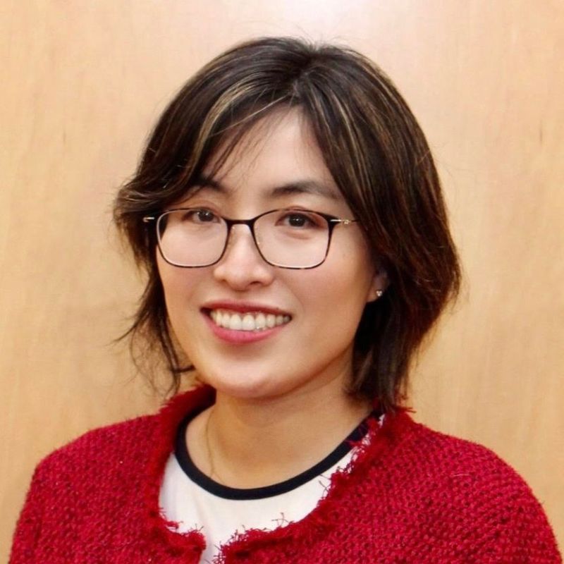 Image shows a headshot of Dr. Xi Zhu