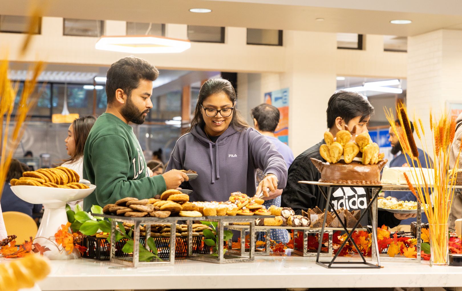 Mavericks at the annual Thanksgiving Dinner" style=" height:1020px; width:1620px" _languageinserted="true" src="https://cdn.prod.web.uta.edu/-/media/project/website/news/releases/2025/11/thanksgiving-2.jpg